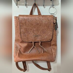 Darcy Marks Faux Leather Backpack W/ Embossed Floral Pattern & Brass Accents